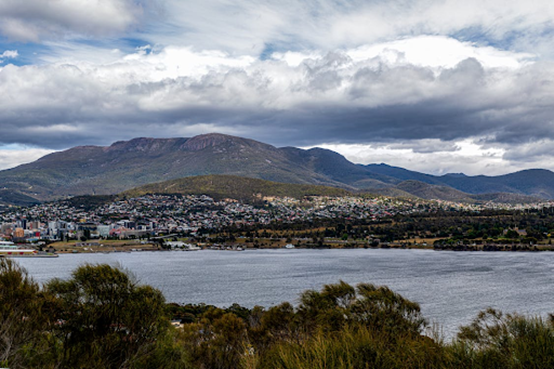 Clouds over Mount Wellington overlooking Hobart city in Australia.