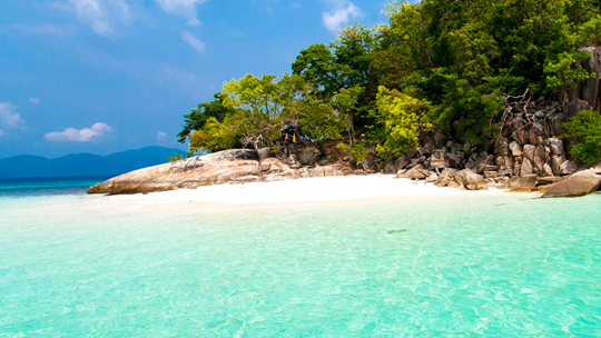Crystal clear water and bright white sand of Koh Lipe.