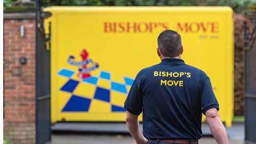Professional mover walking towards Bishop’s move truck