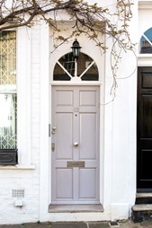 Front door with shiny hardware elements