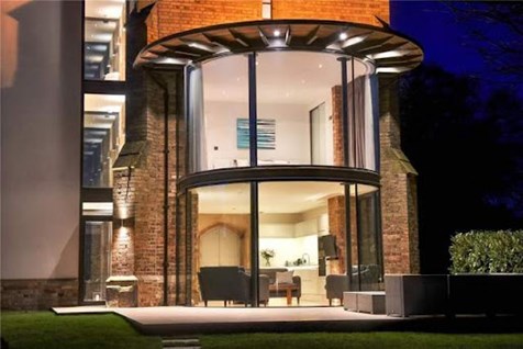 Floor to ceiling windows in converted water home, image from Rightmove