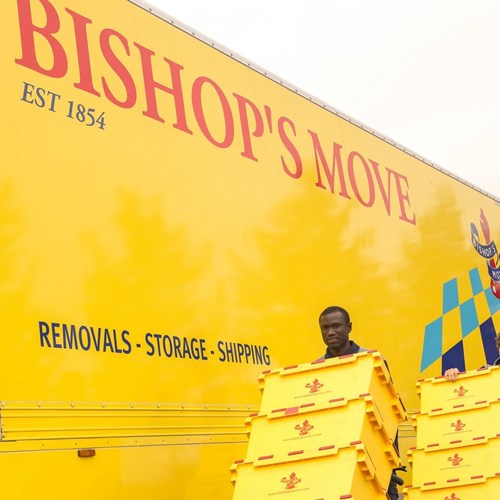 Bishop’s Move employee in front of a removal truck