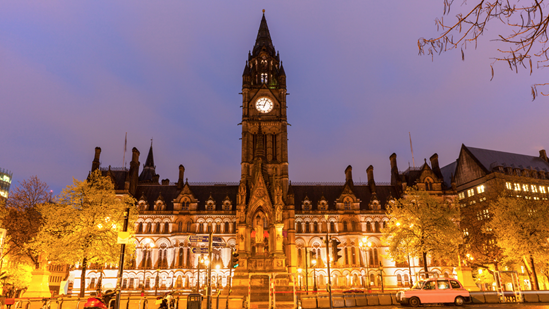 Manchester Town Hall at night.